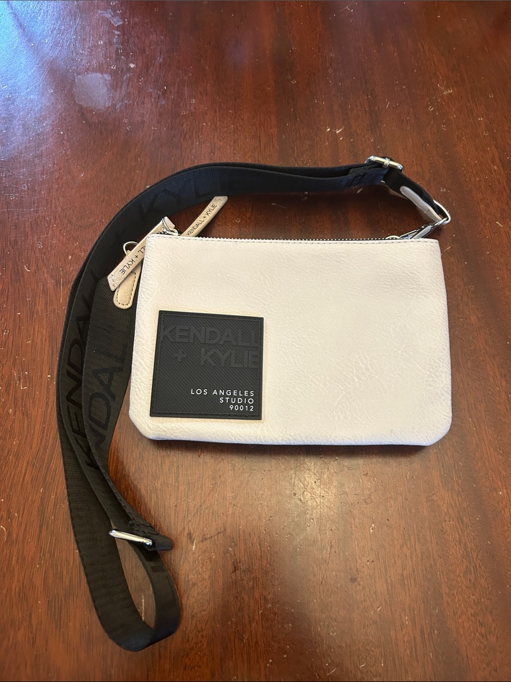 Kendall & Kylie Cream Crossbody Bag with Black Logo Patch and Strap EUC